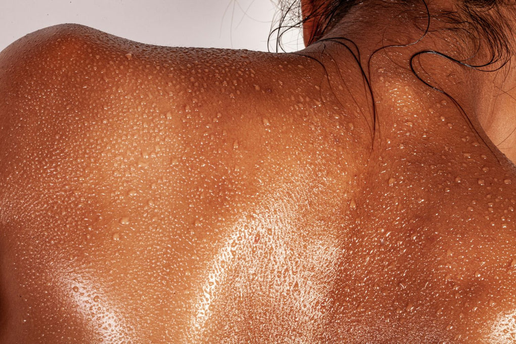 Woman with hydrated skin illustrating how Squirrel's Nut Butter natural salve repairs and restores dry skin and eczema while improving skin health